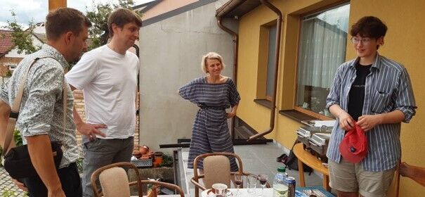 Architects Adam Bohatý and Lukáš Janáč, and students of the Protestant Theological Faculty Anna Juráčková and Marta Slámová at the afterparty